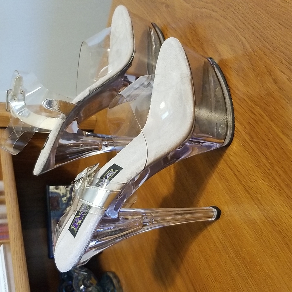 Size 6 5 1/2" clear heels